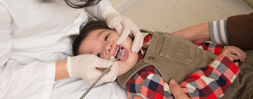 Don't stress about taking your child for their first dental visit. We've got all the tips to get your through it.