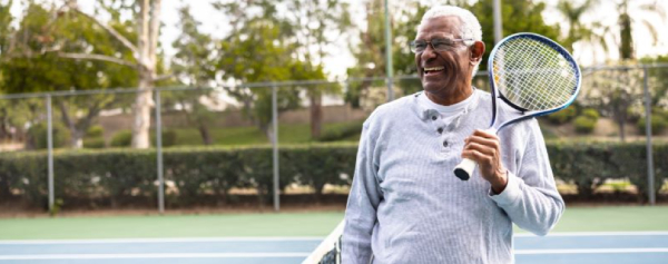 Man with tennis racket