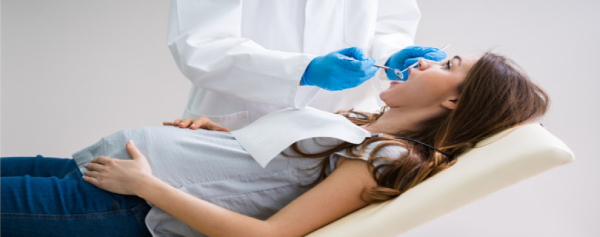Woman in dentist chair